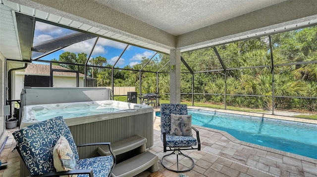 237 Strasburg Dr, Port Charlotte, FL 33954 - outdoor pool featuring a hot tub, a patio, and glass enclosure