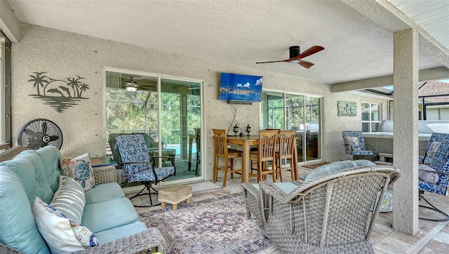 237 Strasburg Dr, Port Charlotte, FL 33954 - sunroom featuring ceiling fan, an outdoor living space, and a hot tub