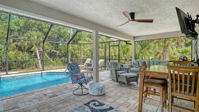 237 Strasburg Dr, Port Charlotte, FL 33954 - sunroom with a ceiling fan and outdoor lounge area