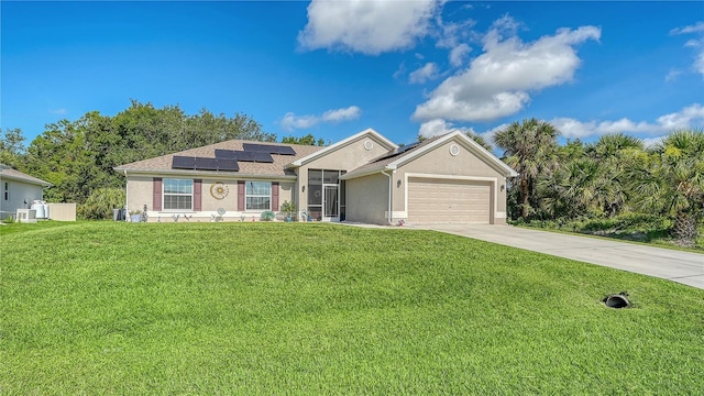 237 Strasburg Dr, Port Charlotte, FL 33954 - ranch-style home featuring an attached garage, solar panels, a front yard, and driveway