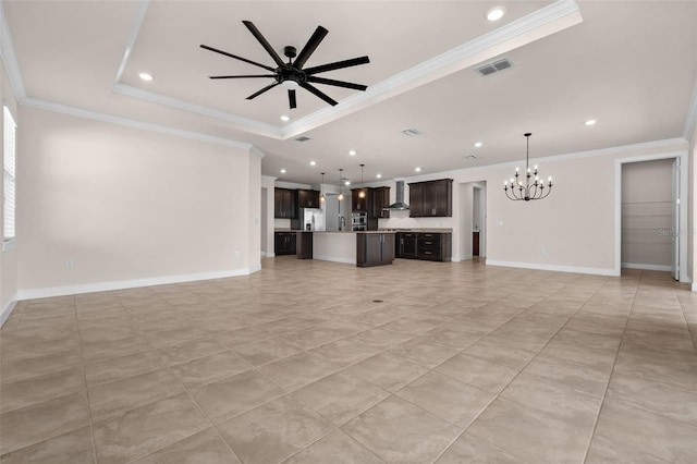 42346 Waterfront Way, Punta Gorda, FL 33982 - unfurnished living room featuring a chandelier, ornamental molding, a tray ceiling, a ceiling fan, and recessed lighting