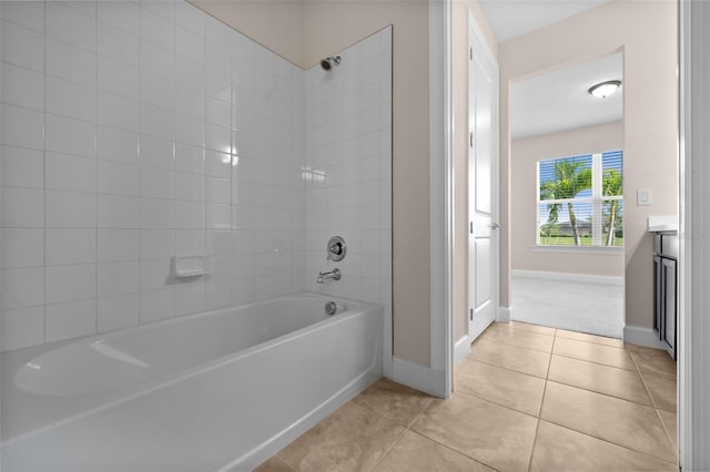 42346 Waterfront Way, Punta Gorda, FL 33982 - full bathroom featuring shower / bath combination, tile patterned floors, baseboards, and vanity