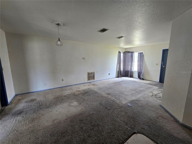 4424 Baroda Ave, North Port, FL 34287 - spare room featuring carpet, a textured ceiling, and baseboards