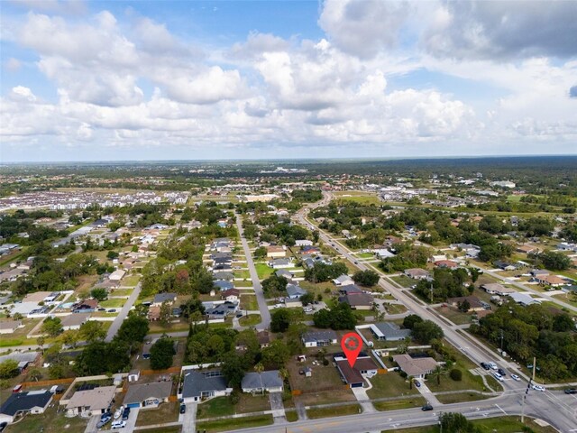 1041 S Salford Blvd, North Port, FL 34287 - aerial overview of property's location with nearby suburban area