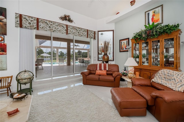 17400 White Water Ct, Punta Gorda, FL 33982 - living area with tile patterned flooring and a high ceiling