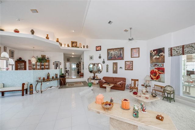 17400 White Water Ct, Punta Gorda, FL 33982 - tiled living room featuring lofted ceiling and a ceiling fan