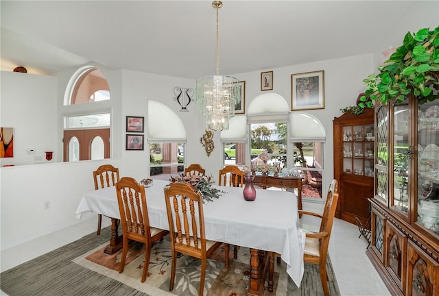 17400 White Water Ct, Punta Gorda, FL 33982 - dining space featuring a chandelier and light tile patterned floors
