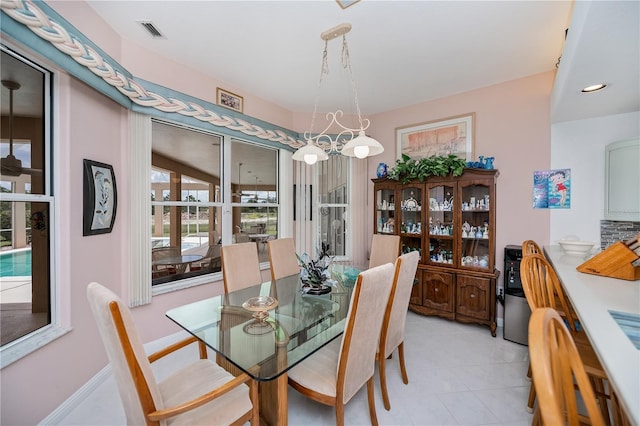17400 White Water Ct, Punta Gorda, FL 33982 - dining area with light tile patterned flooring