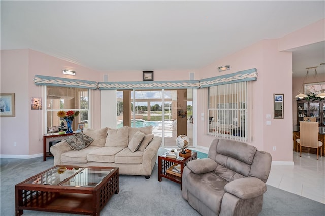 17400 White Water Ct, Punta Gorda, FL 33982 - tiled living room with healthy amount of natural light