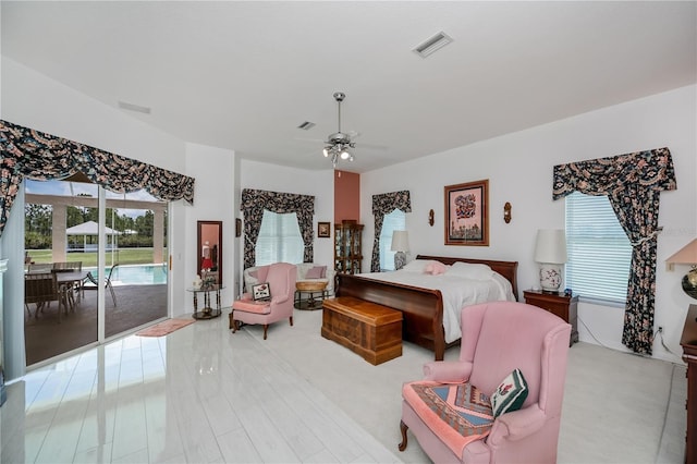 17400 White Water Ct, Punta Gorda, FL 33982 - bedroom featuring access to exterior and a ceiling fan