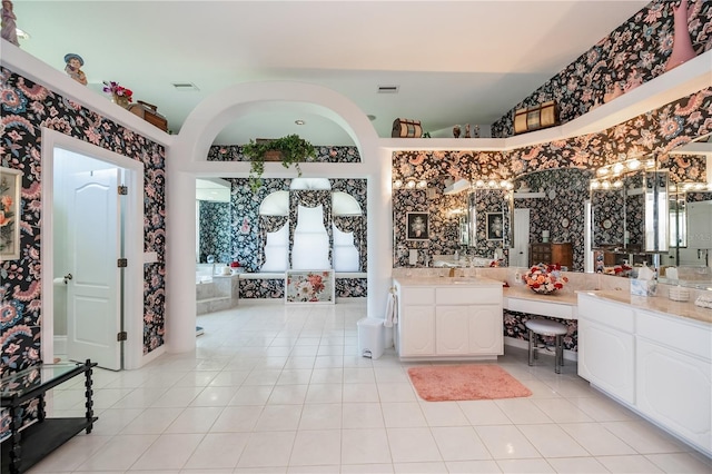 17400 White Water Ct, Punta Gorda, FL 33982 - bathroom featuring wallpapered walls, vanity, tile patterned floors, plenty of natural light, and a chandelier