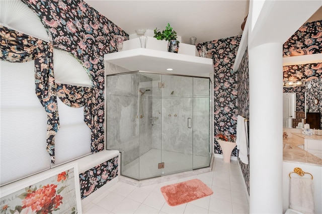17400 White Water Ct, Punta Gorda, FL 33982 - bathroom with wallpapered walls, a shower stall, tile patterned flooring, and vanity