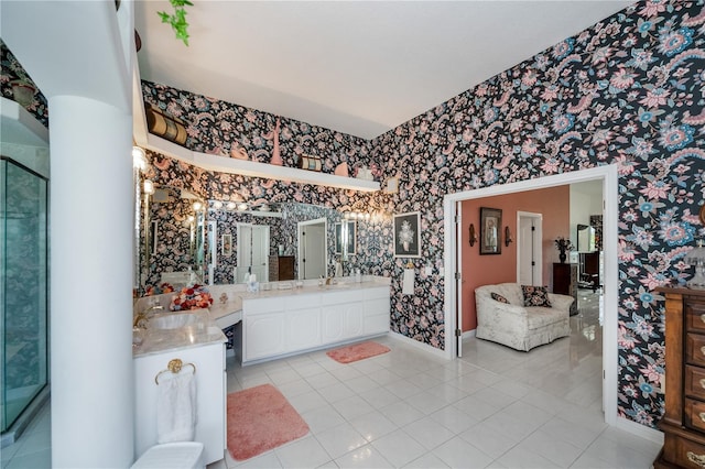 17400 White Water Ct, Punta Gorda, FL 33982 - full bath with wallpapered walls, vanity, tile patterned floors, and a stall shower