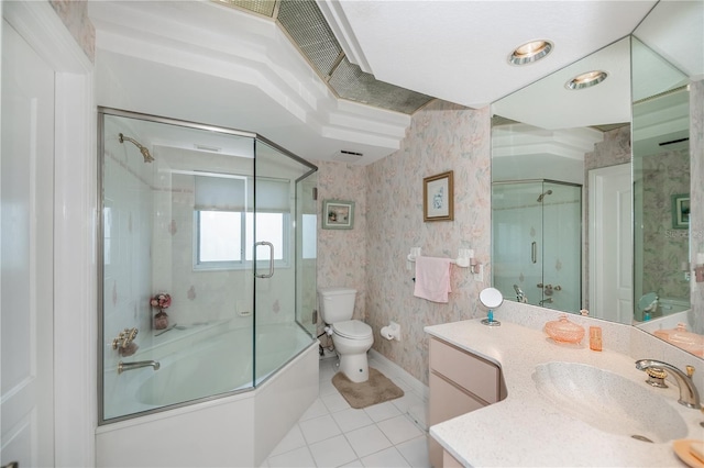 17400 White Water Ct, Punta Gorda, FL 33982 - bathroom featuring tile patterned floors, vanity, shower / bath combination with glass door, and wallpapered walls