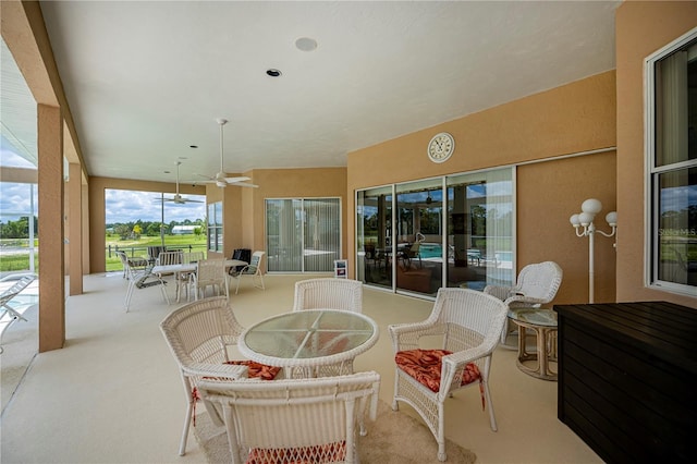 17400 White Water Ct, Punta Gorda, FL 33982 - view of patio / terrace with outdoor dining area and a ceiling fan