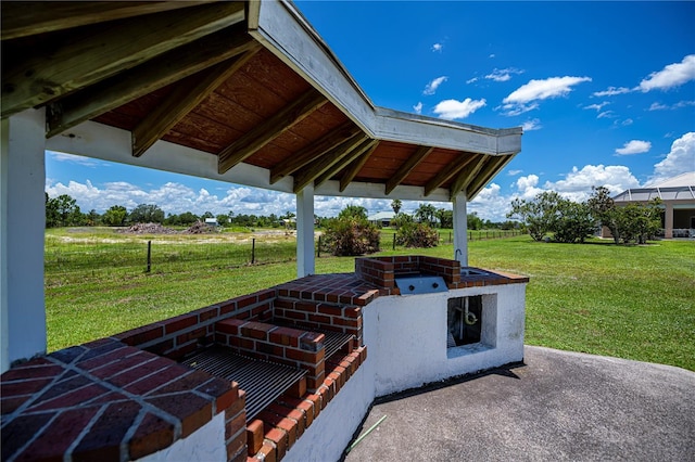 17400 White Water Ct, Punta Gorda, FL 33982 - view of patio / terrace with area for grilling and a view of countryside