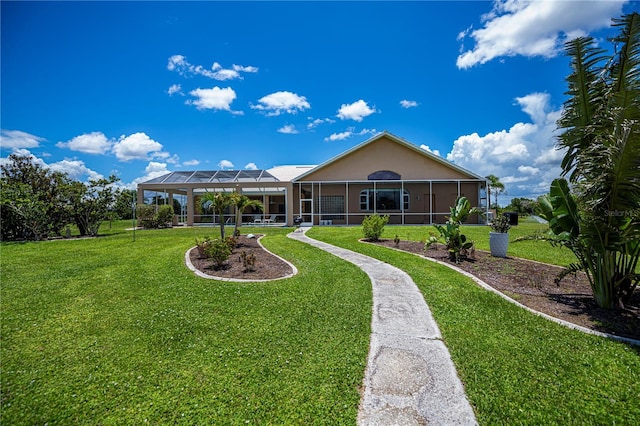17400 White Water Ct, Punta Gorda, FL 33982 - rear view of house featuring a yard and a lanai