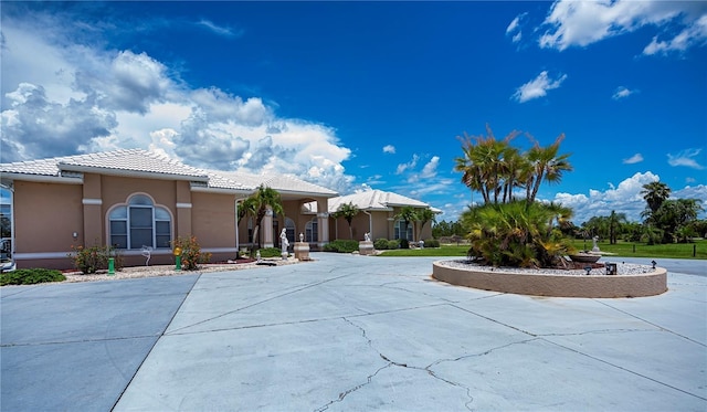 17400 White Water Ct, Punta Gorda, FL 33982 - mediterranean / spanish-style home with a tiled roof and stucco siding