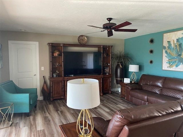 26129 Madras Ct, Punta Gorda, FL 33983 - living room featuring ceiling fan and wood finished floors