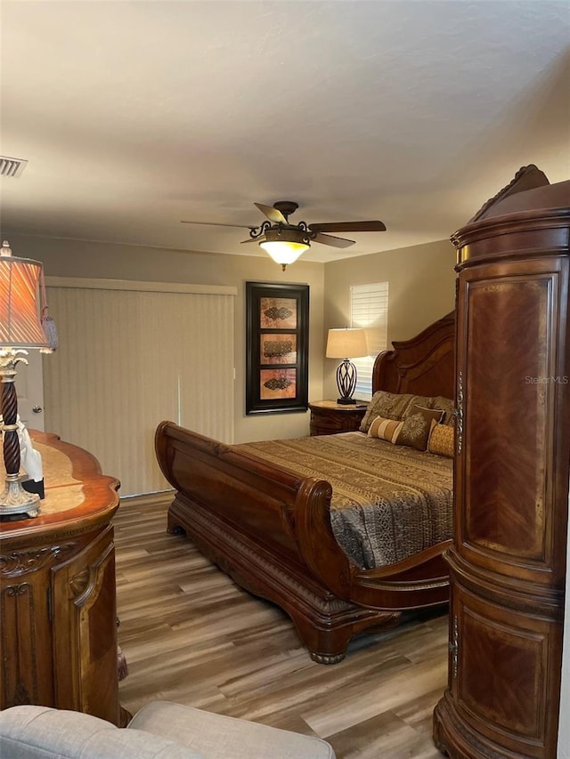 26129 Madras Ct, Punta Gorda, FL 33983 - bedroom with wood finished floors and ceiling fan