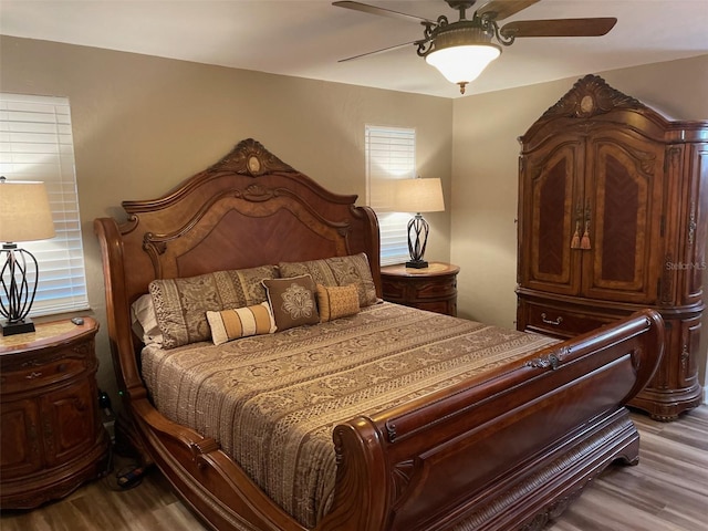 26129 Madras Ct, Punta Gorda, FL 33983 - bedroom featuring wood finished floors and ceiling fan