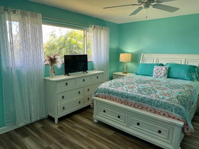 26129 Madras Ct, Punta Gorda, FL 33983 - bedroom featuring dark wood-style floors and ceiling fan