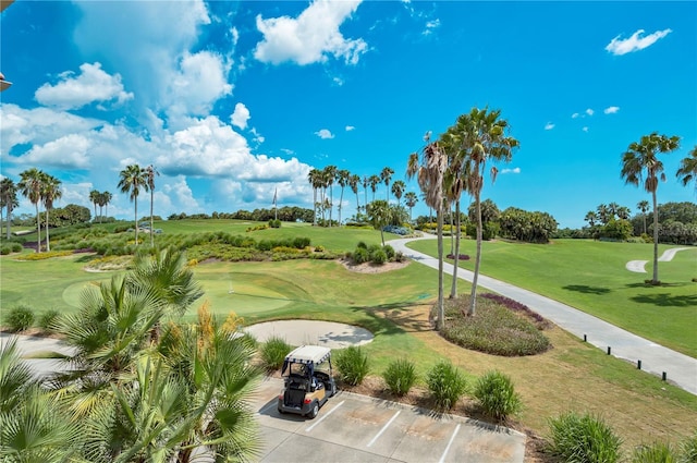 1062 Eagles Flight Way, North Port, FL 34287 - view of home's community with uncovered parking, golf course view, and a lawn