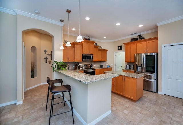 1062 Eagles Flight Way, North Port, FL 34287 - kitchen featuring stainless steel appliances, stone finish floors, a peninsula, baseboards, and recessed lighting