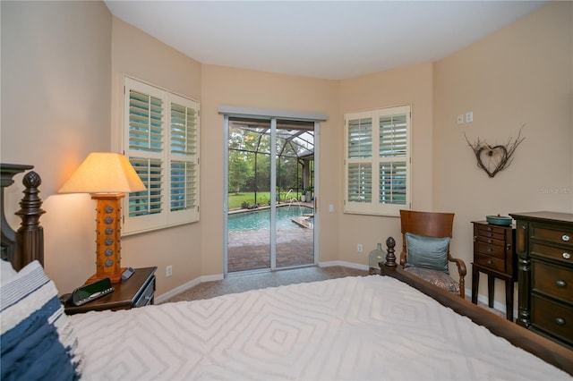 1062 Eagles Flight Way, North Port, FL 34287 - carpeted bedroom with access to exterior and baseboards