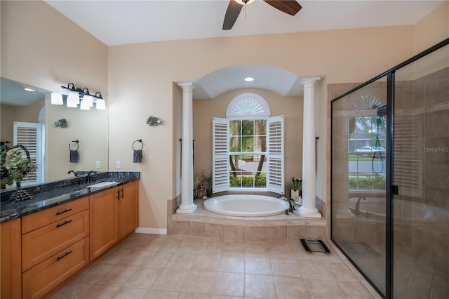 1062 Eagles Flight Way, North Port, FL 34287 - bathroom with decorative columns, vanity, a ceiling fan, and a bath