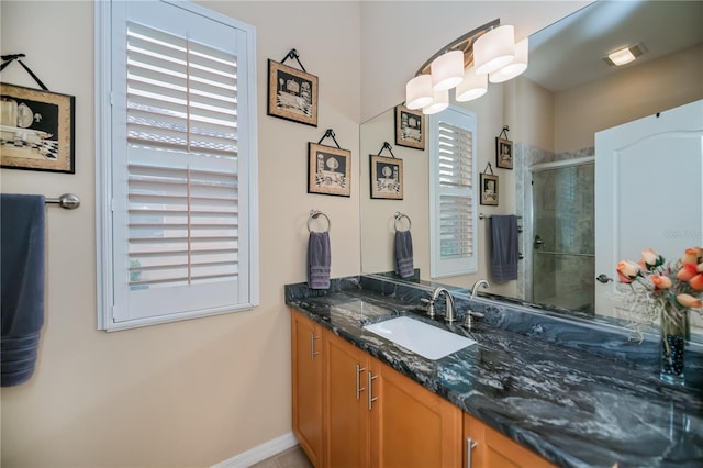 1062 Eagles Flight Way, North Port, FL 34287 - bathroom featuring vanity, a stall shower, and baseboards