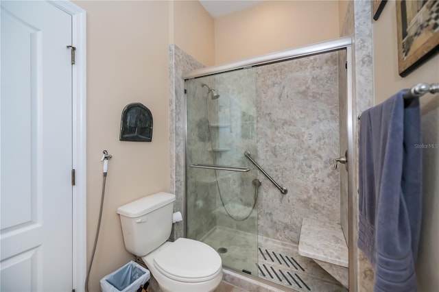 1062 Eagles Flight Way, North Port, FL 34287 - bathroom featuring a stall shower and toilet