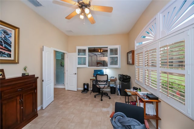 1062 Eagles Flight Way, North Port, FL 34287 - office area with ceiling fan, healthy amount of natural light, and baseboards