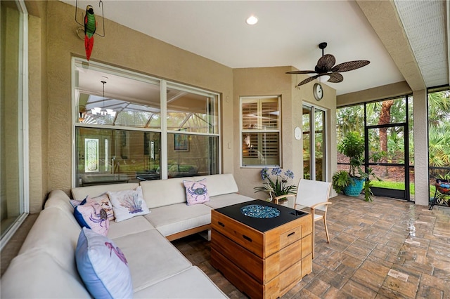1062 Eagles Flight Way, North Port, FL 34287 - sunroom with recessed lighting and a textured wall