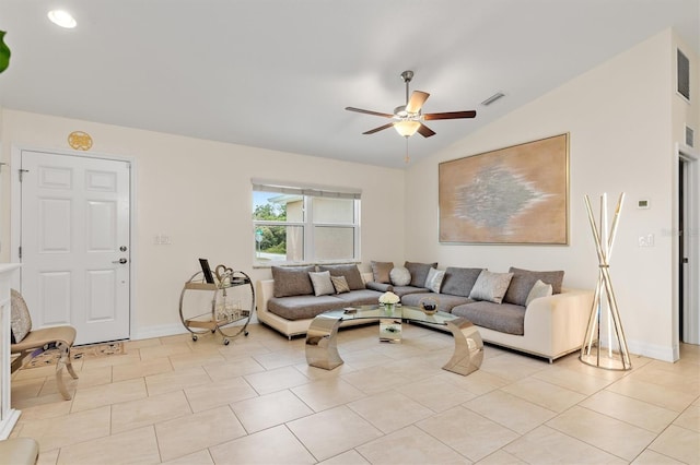 3138 Darius Ave, North Port, FL 34288 - living area with ceiling fan, vaulted ceiling, baseboards, and light tile patterned floors