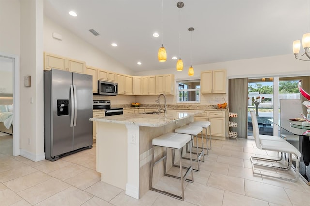 3138 Darius Ave, North Port, FL 34288 - kitchen featuring stainless steel appliances, a sink, tasteful backsplash, lofted ceiling, and plenty of natural light