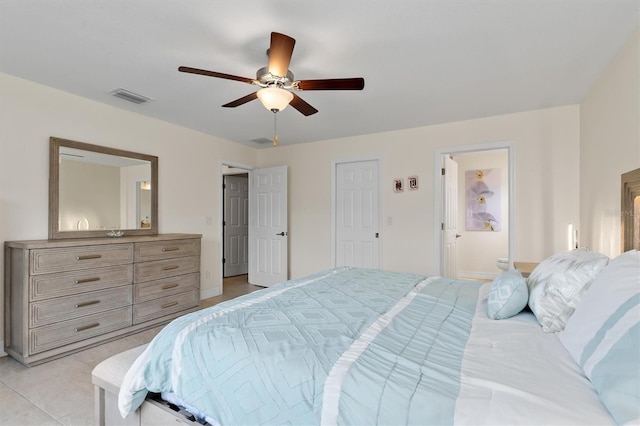 3138 Darius Ave, North Port, FL 34288 - bedroom with a ceiling fan, baseboards, and connected bathroom