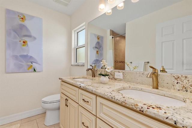 3138 Darius Ave, North Port, FL 34288 - bathroom with toilet, double vanity, a shower with curtain, tile patterned flooring, and baseboards