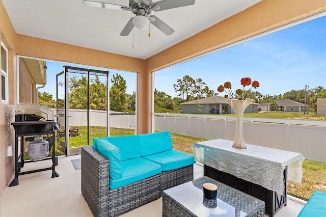 3138 Darius Ave, North Port, FL 34288 - fenced backyard featuring an outdoor hangout area, a patio, and a ceiling fan