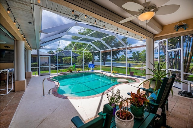 2387 Nuremberg Blvd, Punta Gorda, FL 33983 - swimming pool featuring a lanai, a ceiling fan, a patio, and a water view