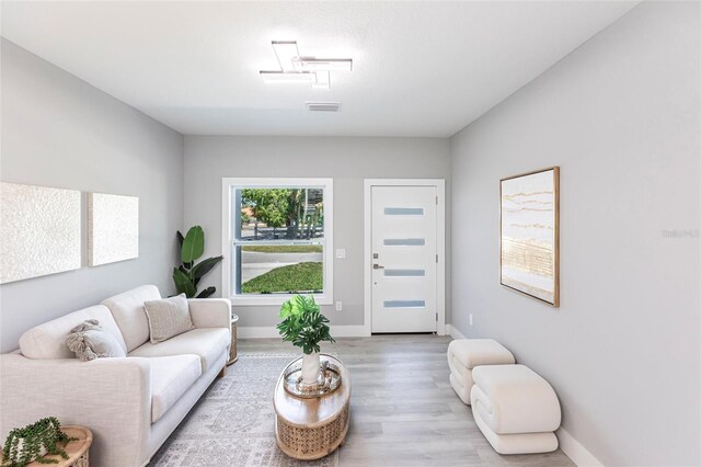 14174 Packard Ave, Port Charlotte, FL 33953 - living room with wood finished floors and baseboards