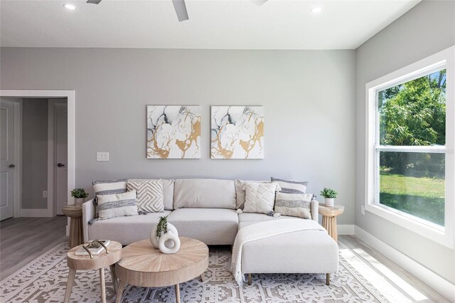 14174 Packard Ave, Port Charlotte, FL 33953 - living area featuring recessed lighting, light wood-style floors, a ceiling fan, and baseboards