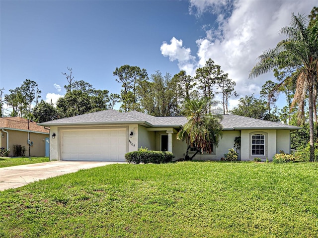4609 Jaslo Ave, North Port, FL 34286 - single story home featuring stucco siding, an attached garage, concrete driveway, and a front lawn