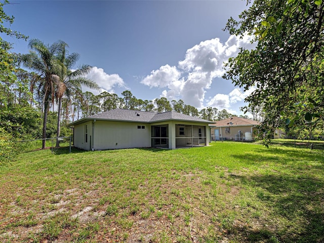 4609 Jaslo Ave, North Port, FL 34286 - back of property featuring a sunroom