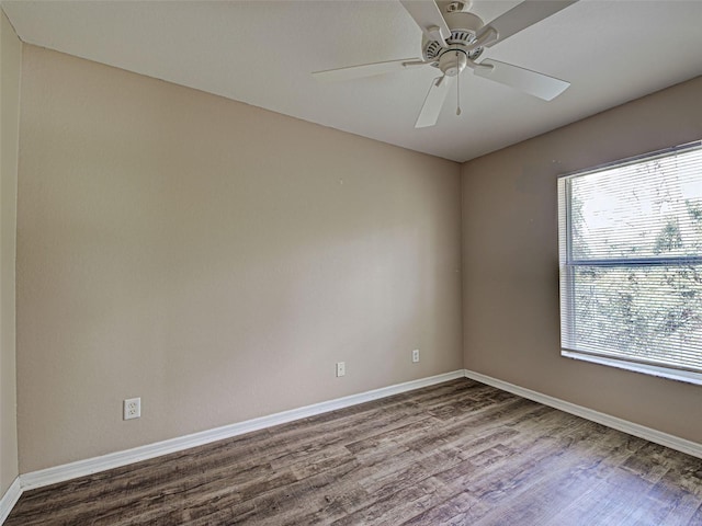4609 Jaslo Ave, North Port, FL 34286 - spare room featuring wood finished floors, healthy amount of natural light, and baseboards