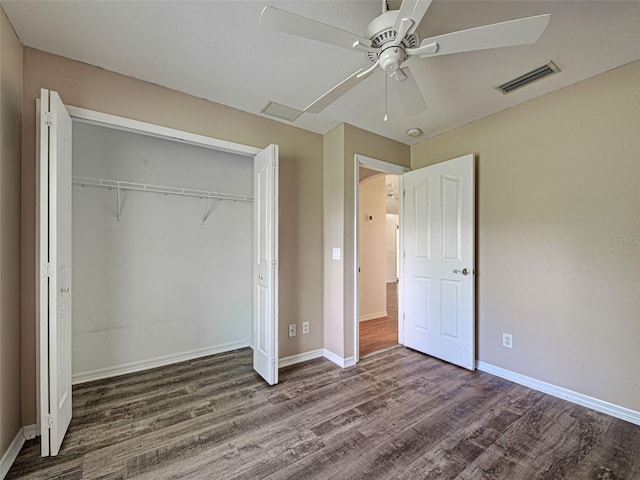 4609 Jaslo Ave, North Port, FL 34286 - unfurnished bedroom featuring wood finished floors, baseboards, a closet, and a ceiling fan