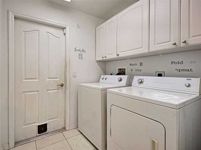 4609 Jaslo Ave, North Port, FL 34286 - washroom with cabinet space, separate washer and dryer, and light tile patterned floors