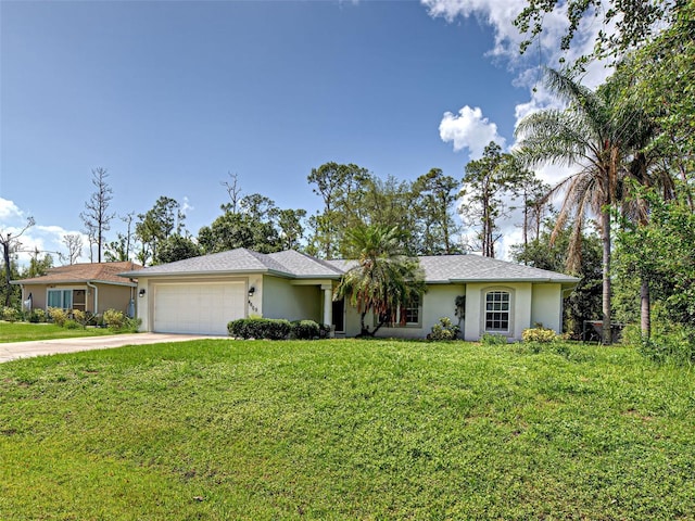 4609 Jaslo Ave, North Port, FL 34286 - ranch-style home featuring stucco siding, an attached garage, a front lawn, and driveway