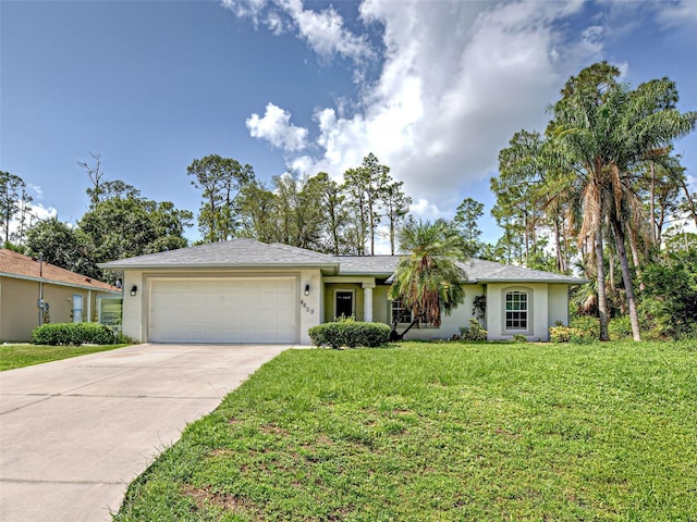 4609 Jaslo Ave, North Port, FL 34286 - ranch-style home featuring a garage, stucco siding, and concrete driveway