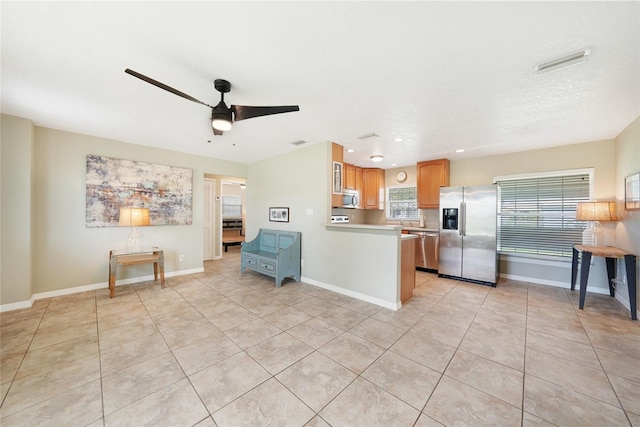 3171 Highlands Rd, Punta Gorda, FL 33983 - kitchen featuring stainless steel appliances, a ceiling fan, light tile patterned floors, light countertops, and recessed lighting